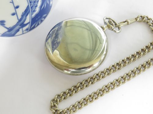 fig 1. 1963 Omega pocket watch with chain