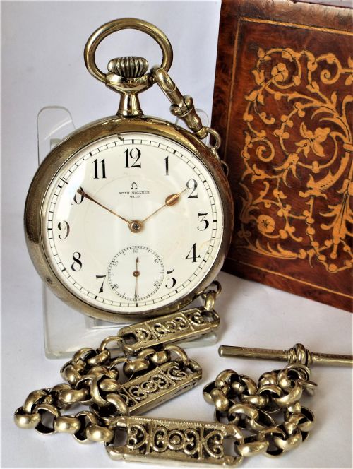 Antique Omega Pocket Watch and Chain.