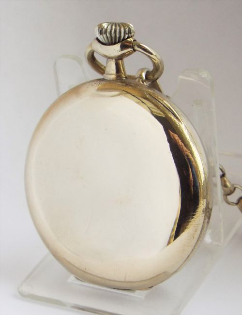 fig 1. Antique Omega pocket watch and chain.
