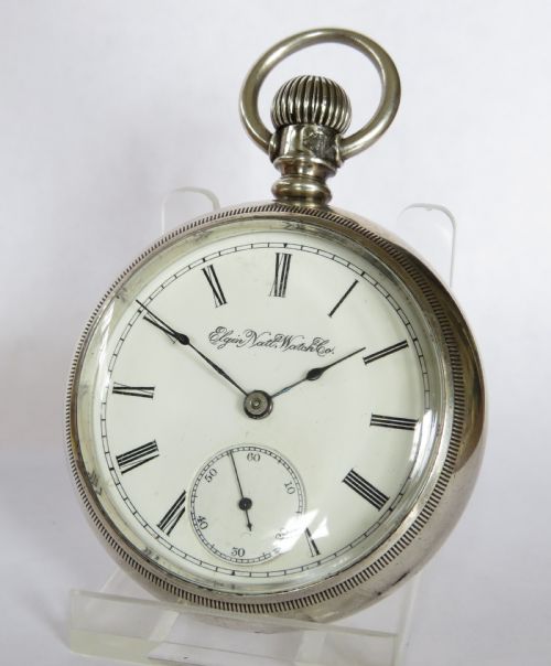 fig 1. Antique silver Elgin steam locomotive pocket watch.