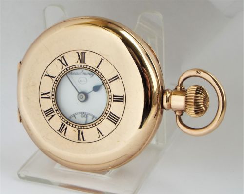 A 1920s Record Dreadnought Half Hunter Pocket Watch.