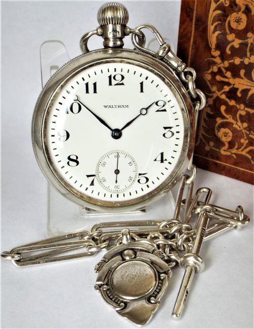 A 1920s Silver Waltham Pocket Watch & Chain.