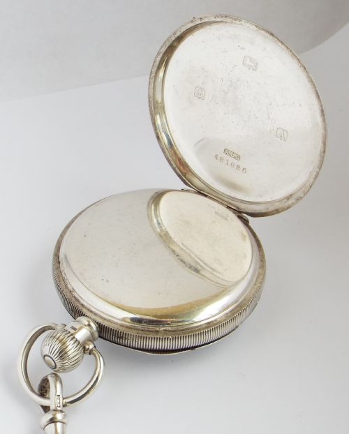 fig 2. A 1920s silver Waltham pocket watch & chain.