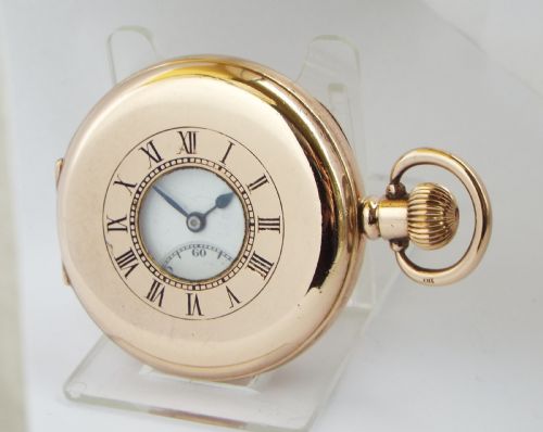 An Antique Minerva Half Hunter Pocket Watch.