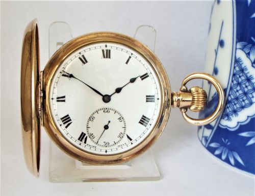 fig 1. An antique Minerva half hunter pocket watch.