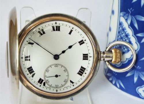 fig 1. Antique silver Cyma half hunter pocket watch.