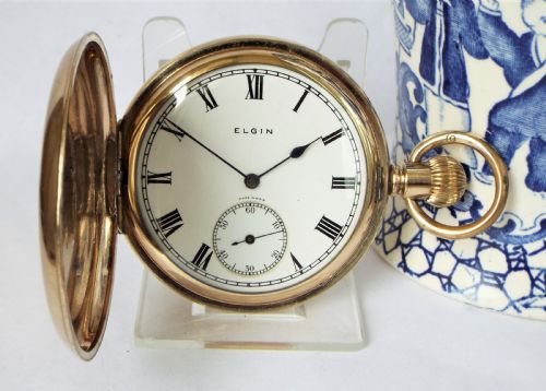 A 1920s Elgin Full Hunter Pocket Watch.