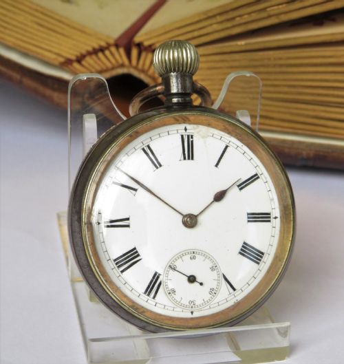 fig 1. An antique gun metal Omega pocket watch.