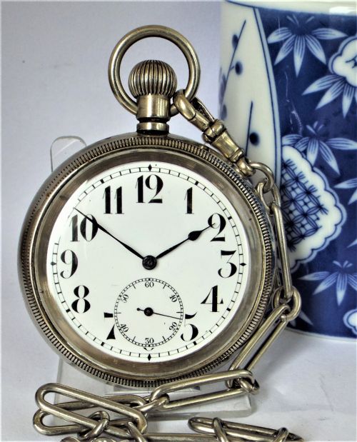 fig 1. 1920s Swiss pocket watch and chain.