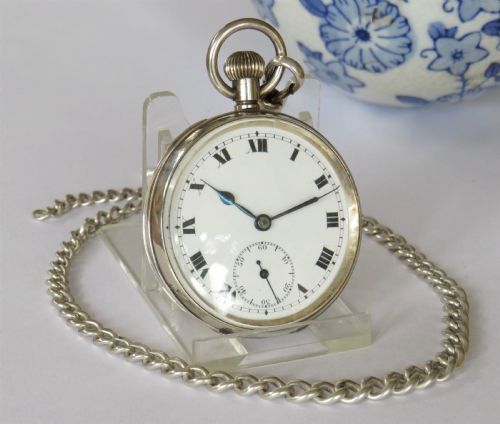 fig 1. 1929 Swiss silver pocket watch and chain