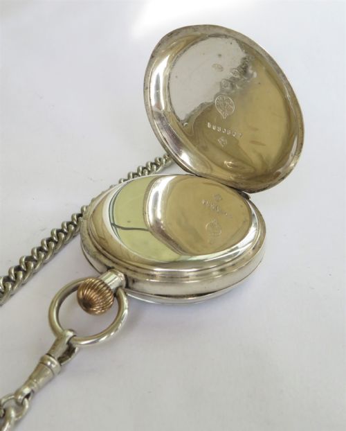 fig 1. Antique silver Omega pocket watch and chain