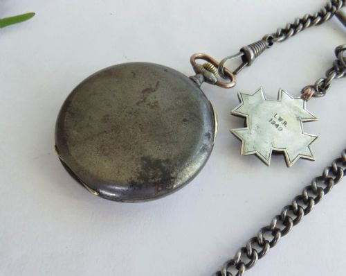 fig 2. 1920s Dollar gun metal pocket watch from Edouard Kummer