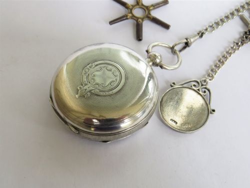 fig 1. Antique silver pocket watch, chain & cricket fob