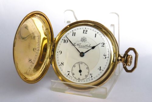 A 1930s Thomas Russell Full Hunter Pocket Watch.