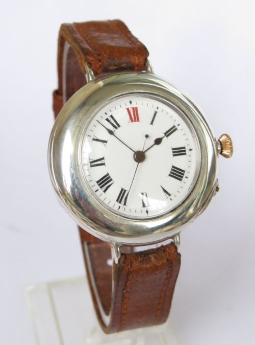 fig 1. 1909 gents silver Longines wrist watch, Sir John Bennett