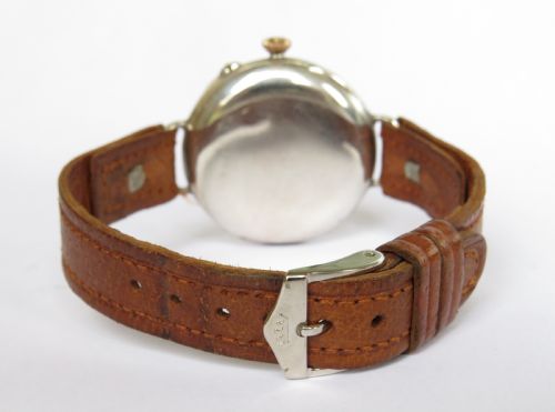 fig 2. 1909 gents silver Longines wrist watch, Sir John Bennett