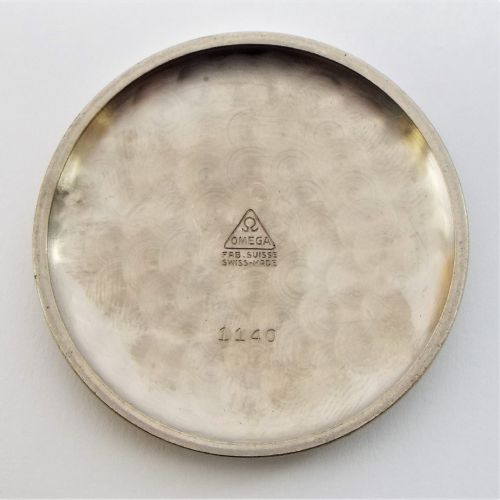 fig 1. 1940s Omega military pocket watch & albert