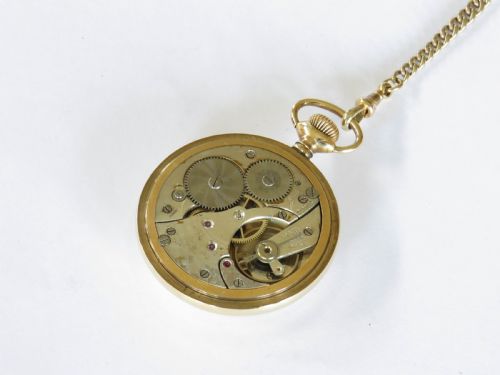 fig 1. 1920s Swiss pocket watch and albert