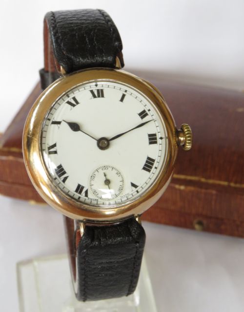fig 1. Gents 9ct gold Omega wrist watch, 1921