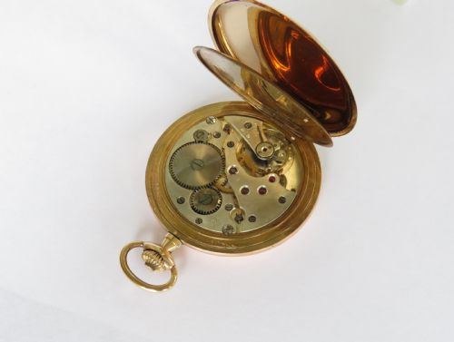 fig 1. 1930s full hunter pocket watch from the Roa Watch Company