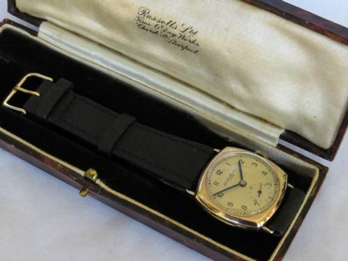fig 1. 9ct gold cushion cased wristwatch from Ths Russell, 1944
