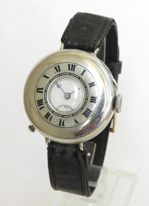 fig 1. Gents antique silver half hunter trench watch