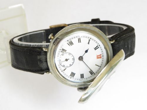 fig 2. Gents antique silver half hunter trench watch