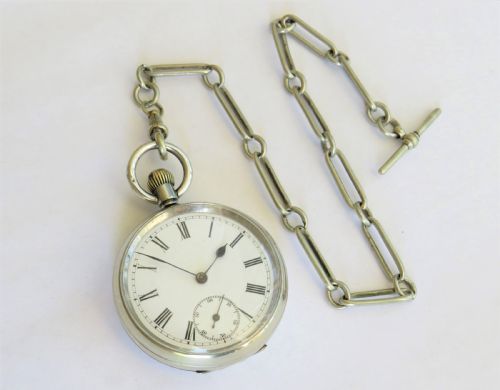 fig 1. Antique Omega pocket watch and chain