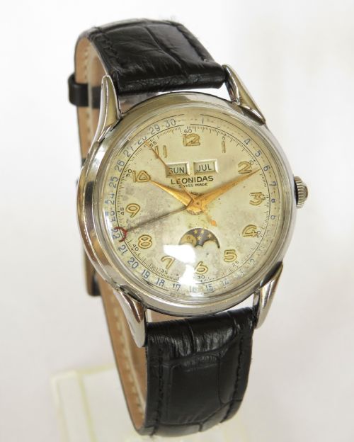 fig 1. Gents 1950s Leonidas triple date wrist watch