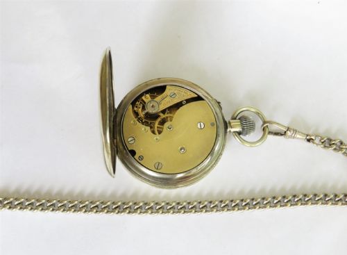 fig 1. Antique nickel pocket watch and chain.