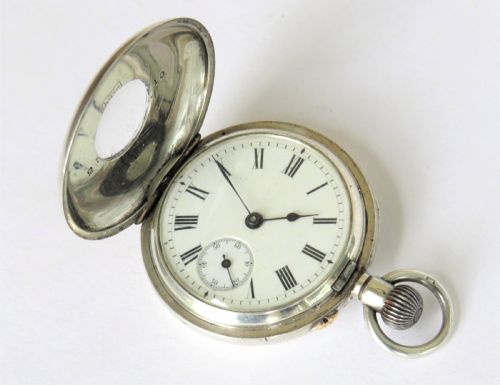 fig 1. Antique silver half hunter fob watch