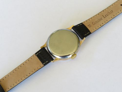 fig 1. Gents 1950s Smiths De Luxe wrist watch