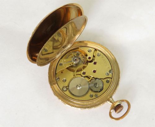 fig 1. 1930s Favor full hunter pocket watch