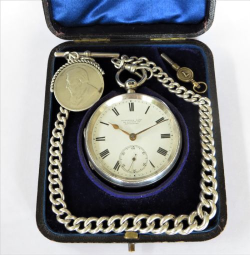 fig 1. Antique silver Russells Ltd silver pocket watch and albert