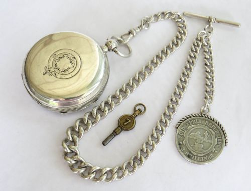 fig 3. Antique silver Russells Ltd silver pocket watch and albert
