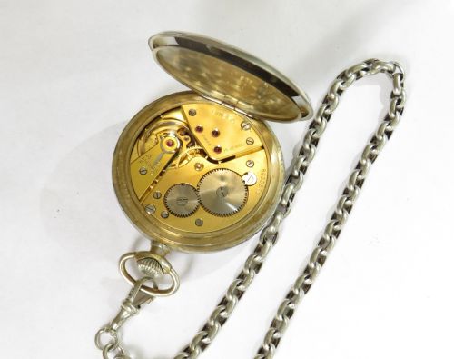 fig 1. 1938 Omega pocket watch and chain