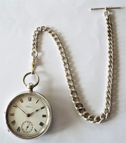 fig 1. An antique silver Waltham pocket watch & chain.