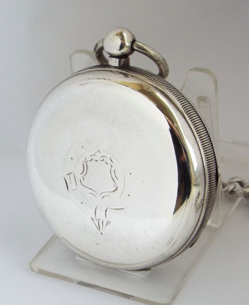 fig 2. An antique silver Waltham pocket watch & chain.