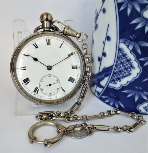 Antique Swiss Pocket Watch and Chain.