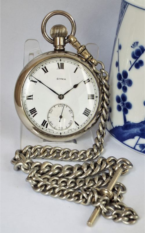 A 1920s Cyma Pocket Watch with Chain.