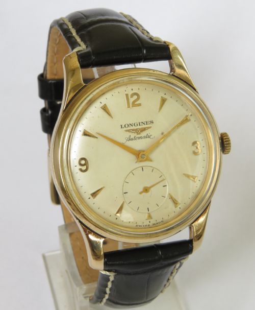 fig 1. Gents 9ct gold Longines wrist watch, 1956
