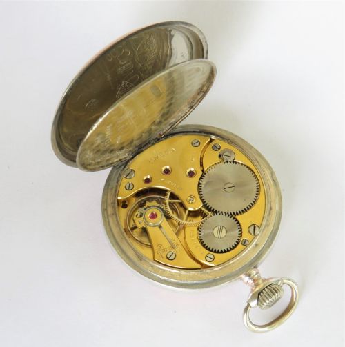 fig 3. Silver Omega pocket watch with rare dial, 1938