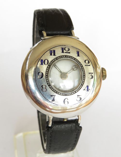 fig 1. Antique silver half hunter wrist watch