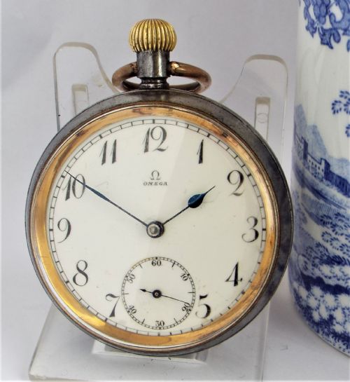 An Antique Gun Metal Omega Pocket Watch.
