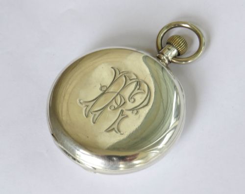 fig 1. Silver Cyma half hunter pocket watch for J W Benson