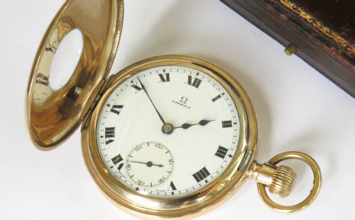 fig 1. Antique Omega half hunter pocket watch