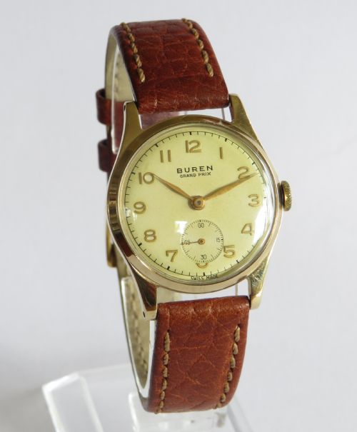 fig 1. Mid-size 9ct gold Buren Grand Prix wrist watch, 1956