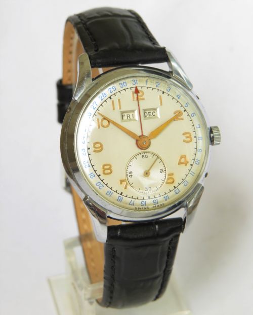 fig 1. Gents 1950s triple date wrist watch