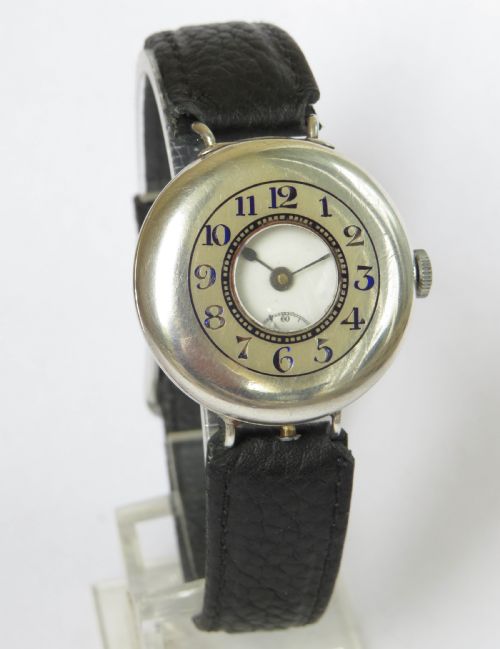 fig 2. Antique mid-size silver half hunter trench watch