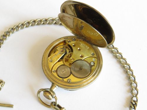 fig 2. Antique Omega pocket watch with chain